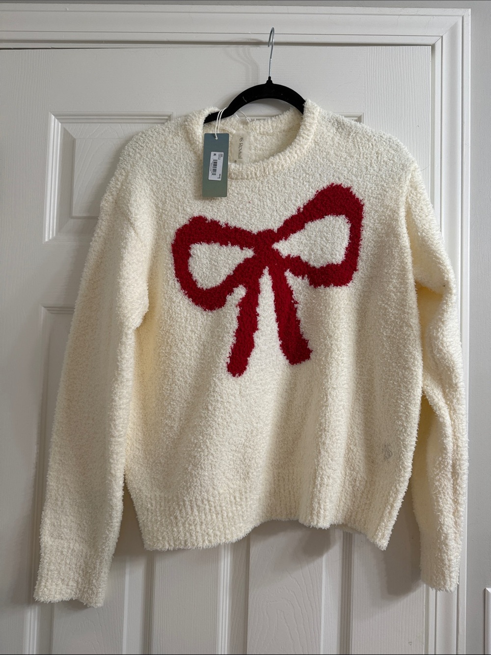 Cozy Cream Sweater with Red Bow